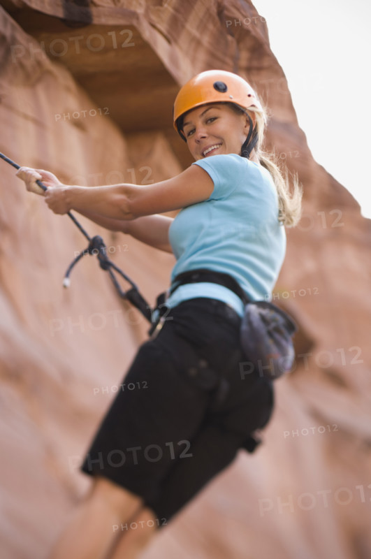Close up of woman rock climbing. Date : 2007