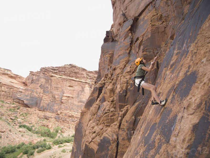 Woman rock climbing. Date : 2007