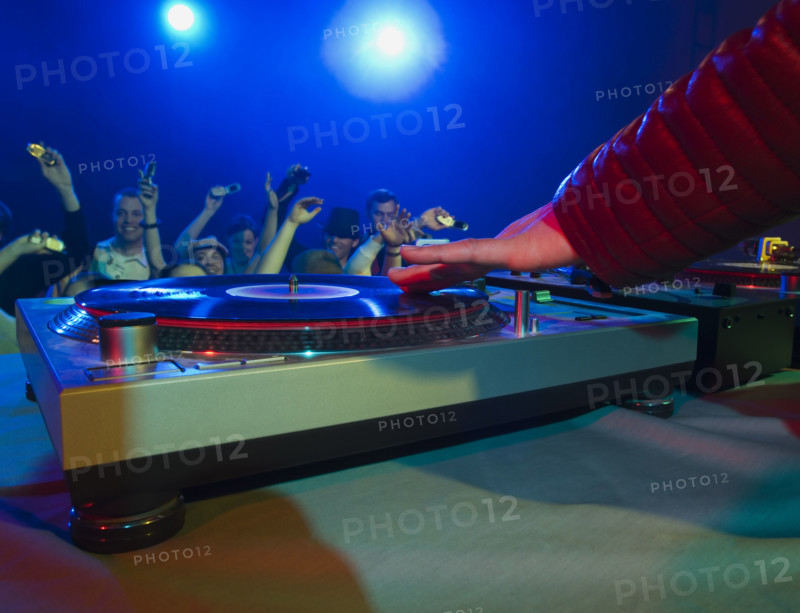 Crowd cheering for DJ. Date : 2007