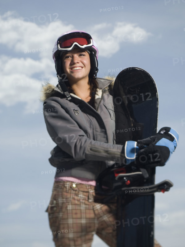 Snowboarder holding board. Date : 2007