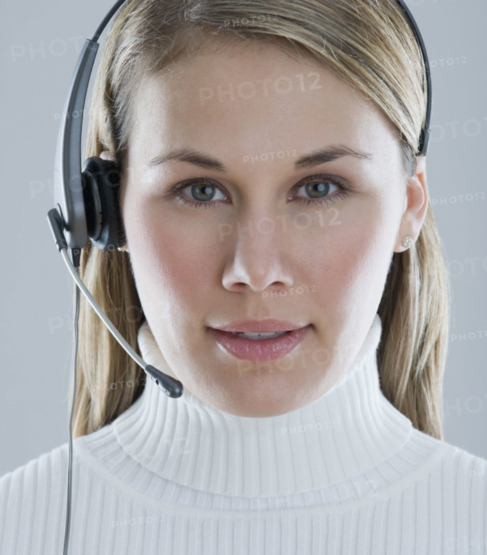 Woman wearing headset.