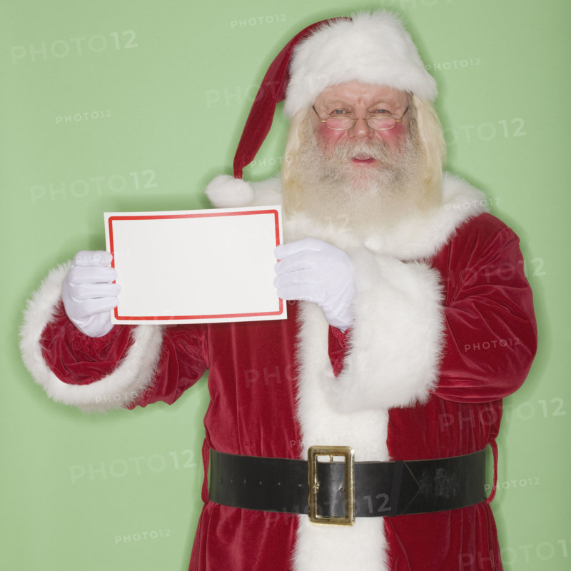 Santa Claus holding blank sign.