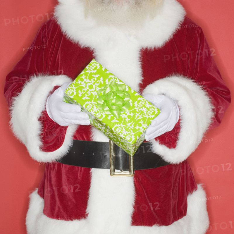 Santa Claus holding gift.