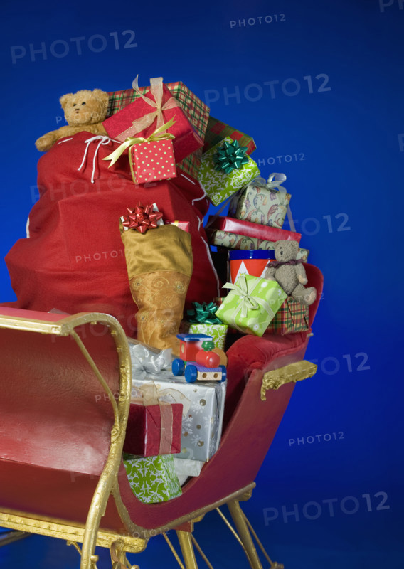 Sleigh with bag of Christmas toys.