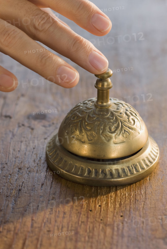 Man ringing service bell.