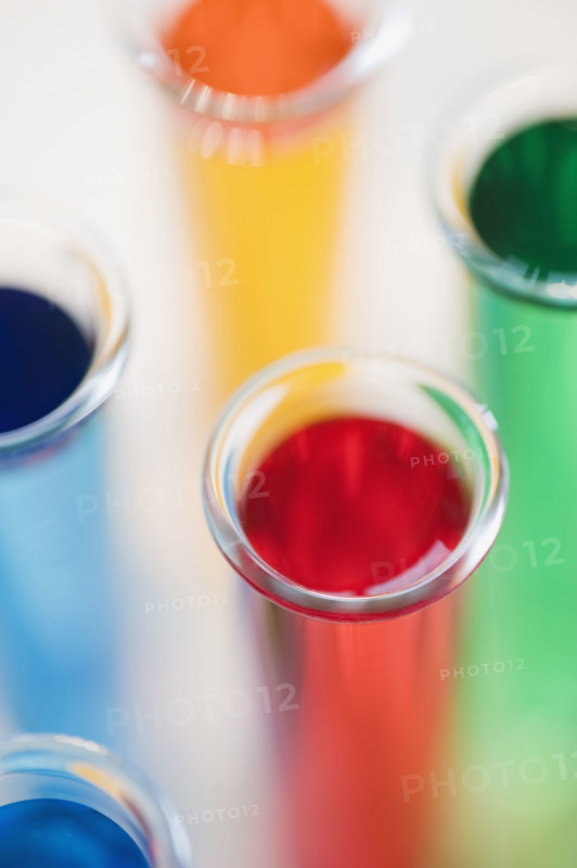 Multi-colored liquids in vials.