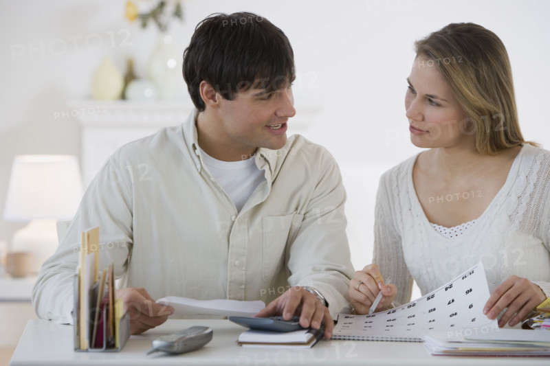 Couple paying bills.