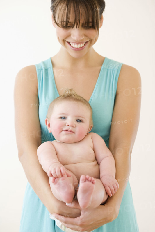 Mother holding baby. Date : 2008