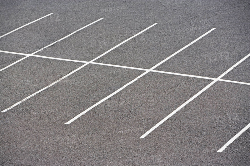Rows of empty parking spaces. Date : 2008