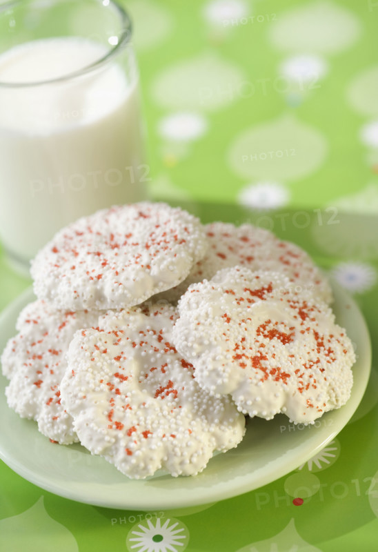 Plate of cookies next to glass of milk. Date : 2008