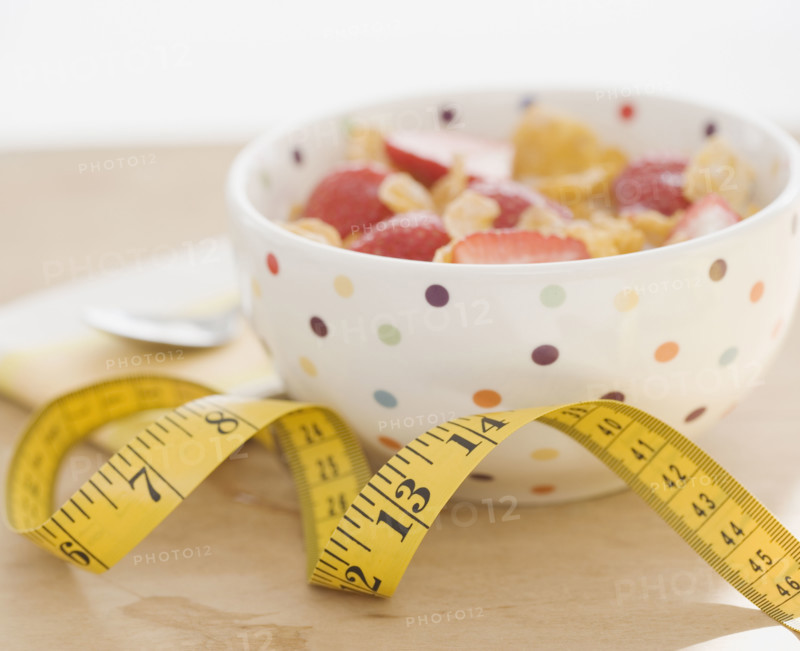 Close up of cereal and measuring tape. Date : 2008