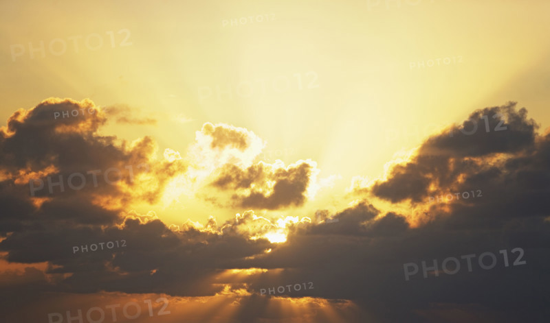 Sun shining through clouds. Date : 2008