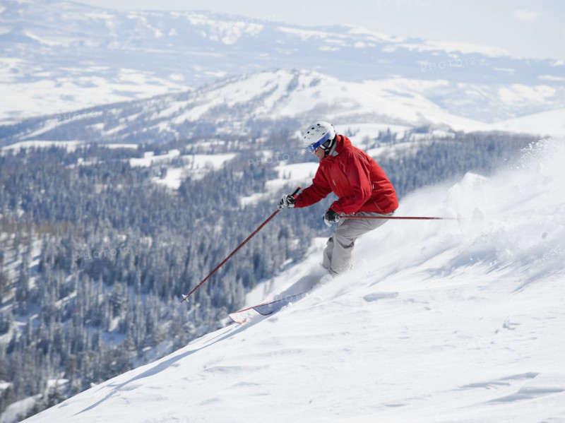 Man skiing downhill. Date : 2008
