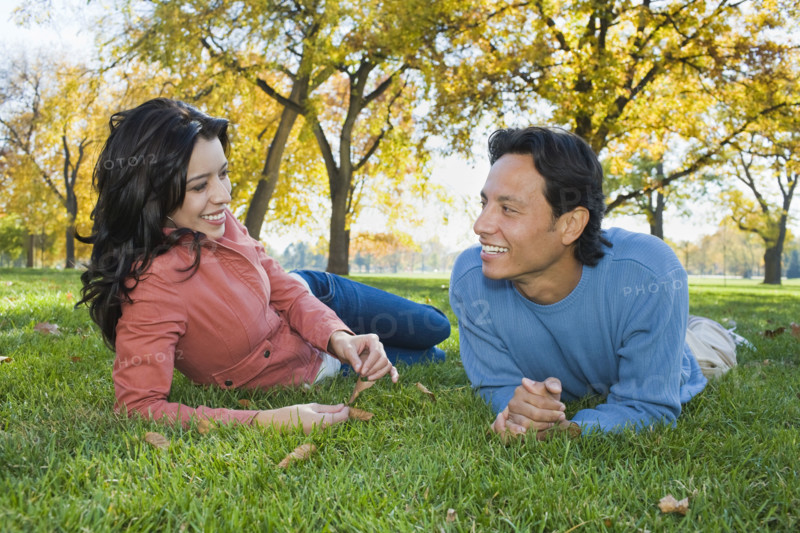 Couple laying in grass. Date : 2008