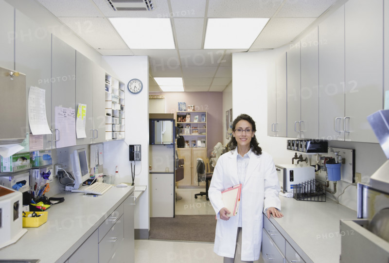 Female doctor standing in office. Date : 2008