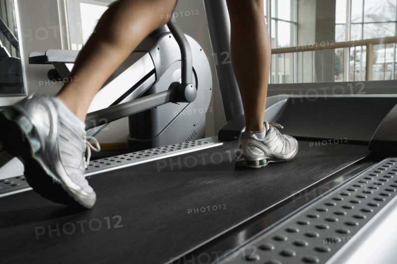 Woman walking on treadmill. Date : 2008