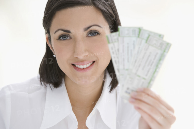 Woman holding tickets. Date : 2008