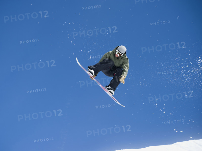 Man on snowboard in air. Date : 2008