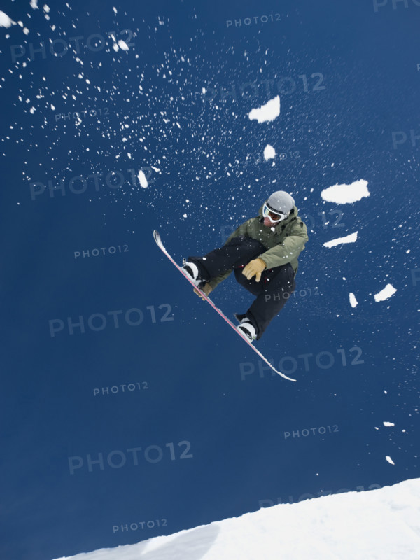 Man on snowboard in air. Date : 2008
