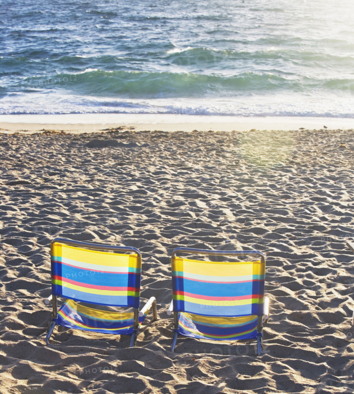Empty beach chairs on sand. Date : 2008
