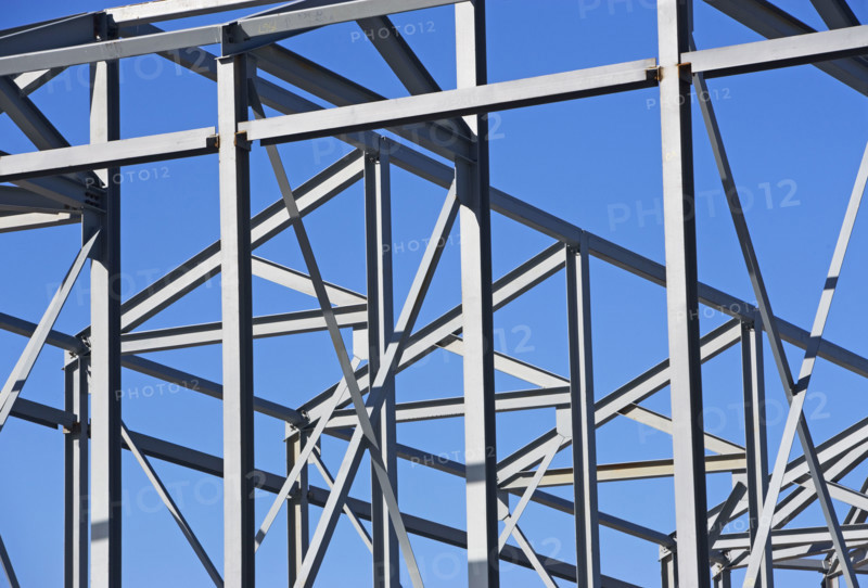 Beams at construction site under blue sky. Date : 2008
