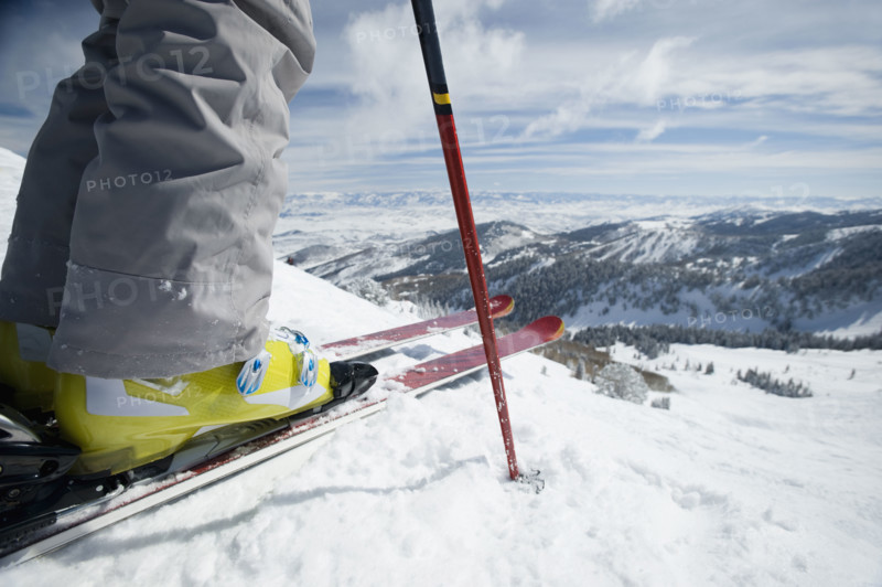 Close up of skier at top of mountain. Date : 2008