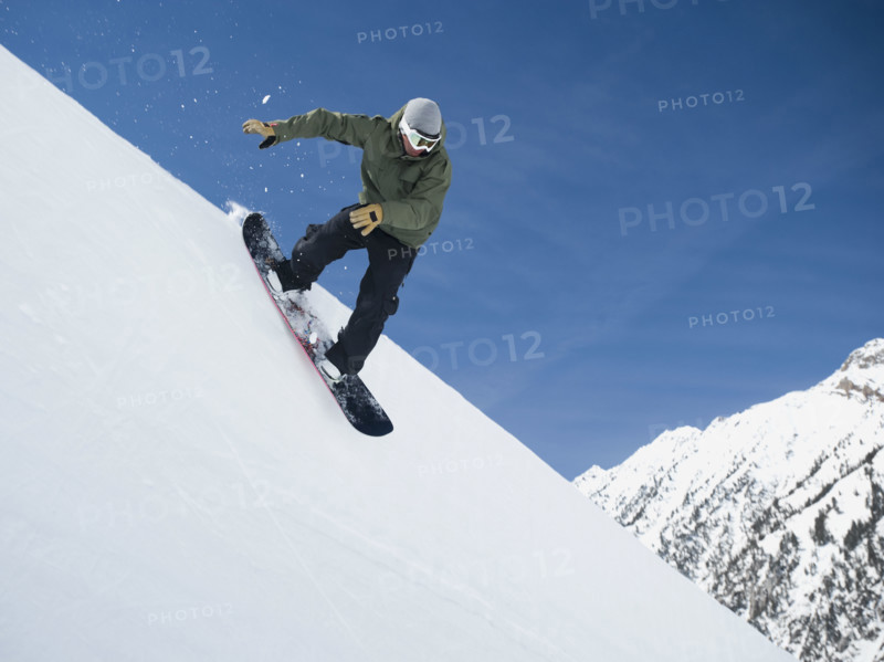 Man on snowboard in air. Date : 2008