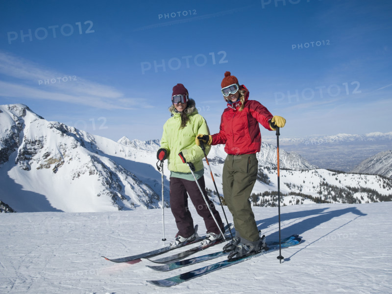Women standing on skis, Wasatch Mountains, Utah, United States. Date : 2008