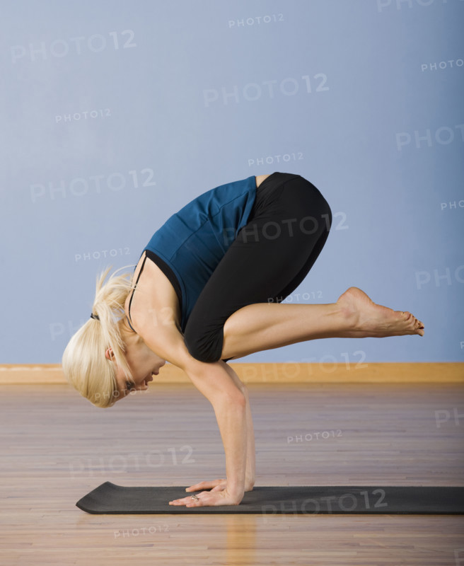 Woman practicing yoga. Date : 2008