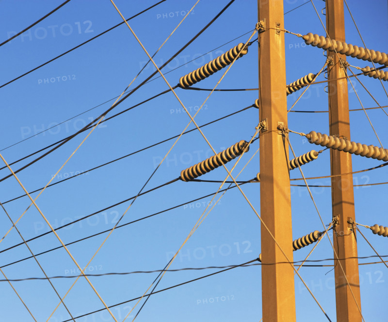 Low angle view of power lines on poles. Date : 2008
