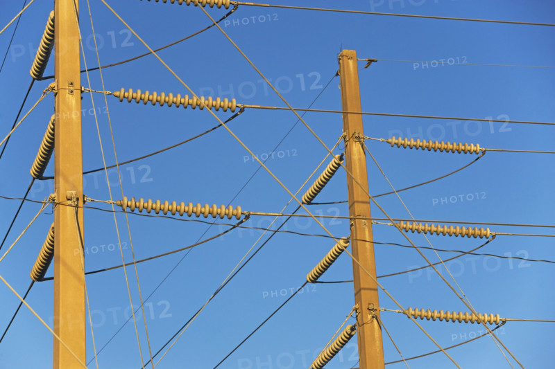 Low angle view of power lines on poles. Date : 2008