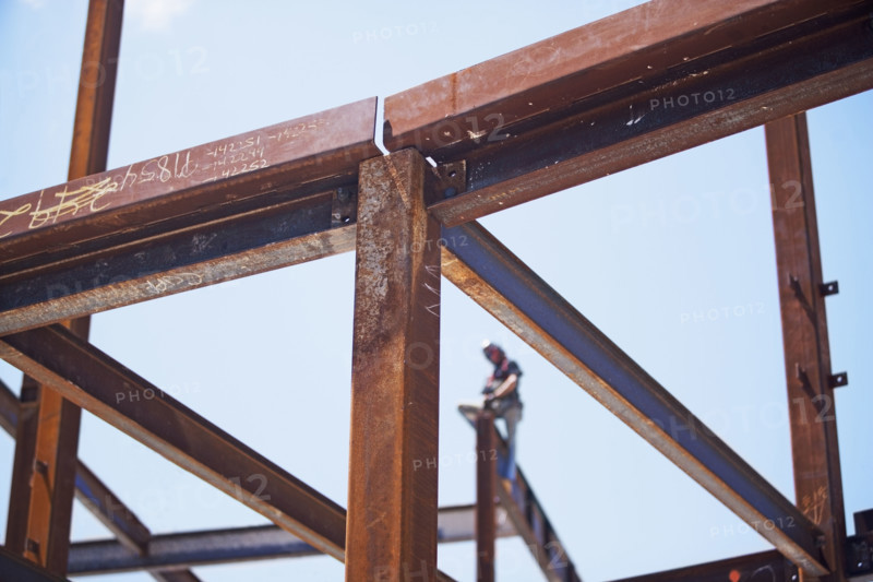 Construction worker on steel beam at construction site. Date : 2008
