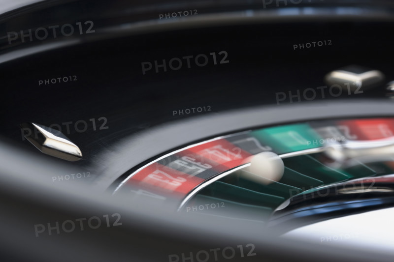 Close up of spinning roulette table.