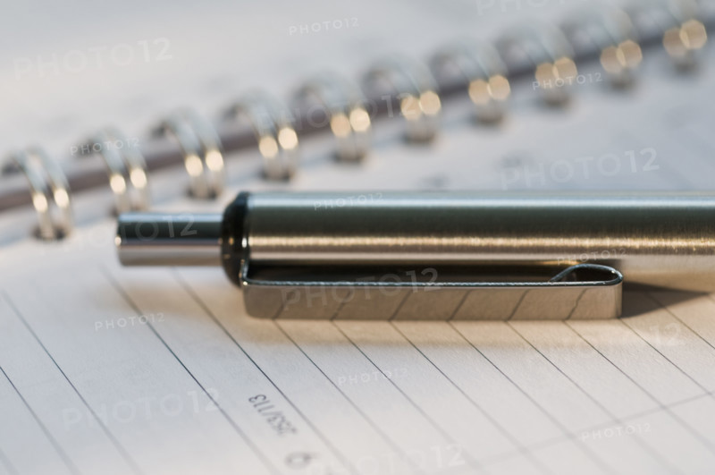 Close up of pen and organizer. Date : 2008