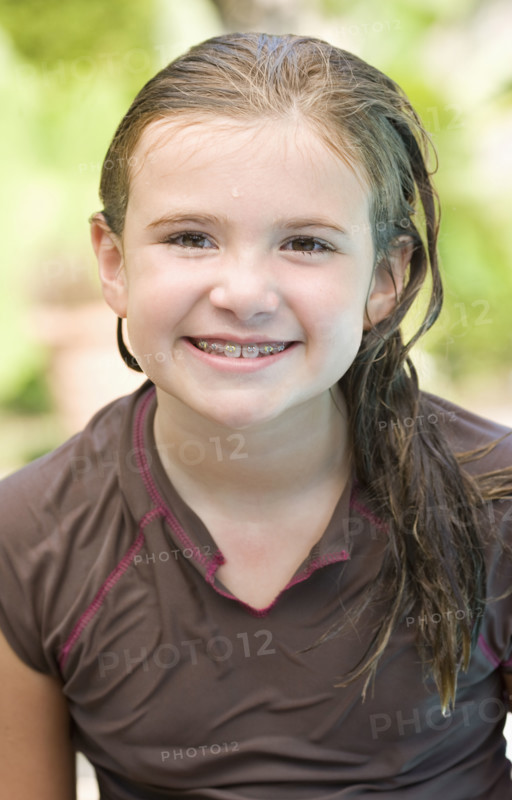 Portrait of girl in wet swimming shirt. Date : 2008