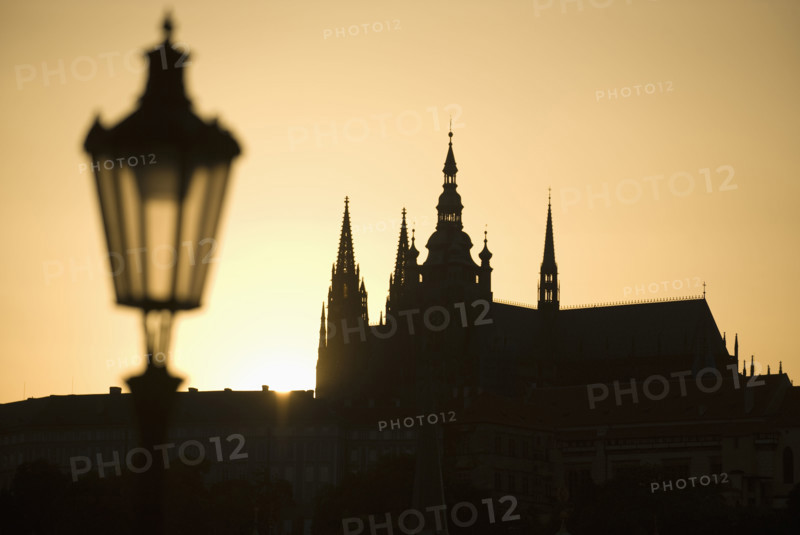Sunset over silhouetted cathedral.