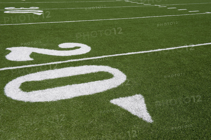 Twenty yard line on football field.