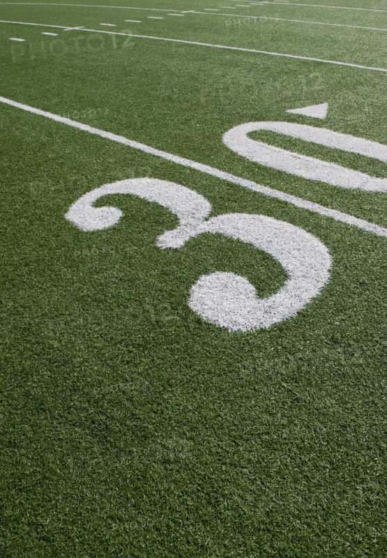 Thirty yard line on football field.