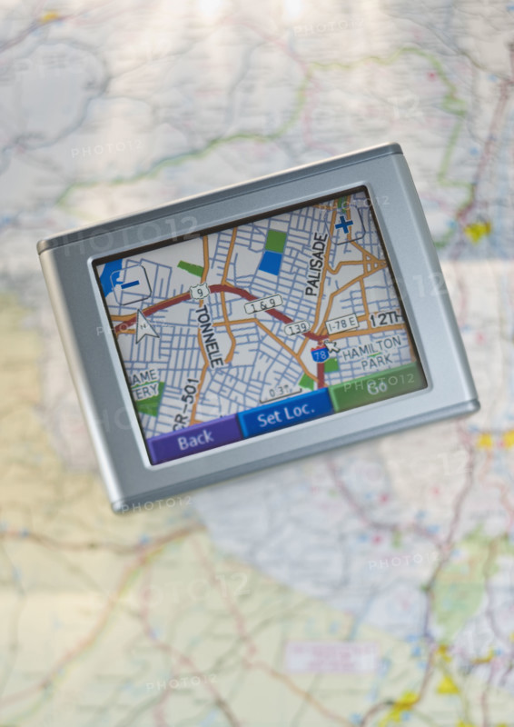 Close up of navigational system and map.