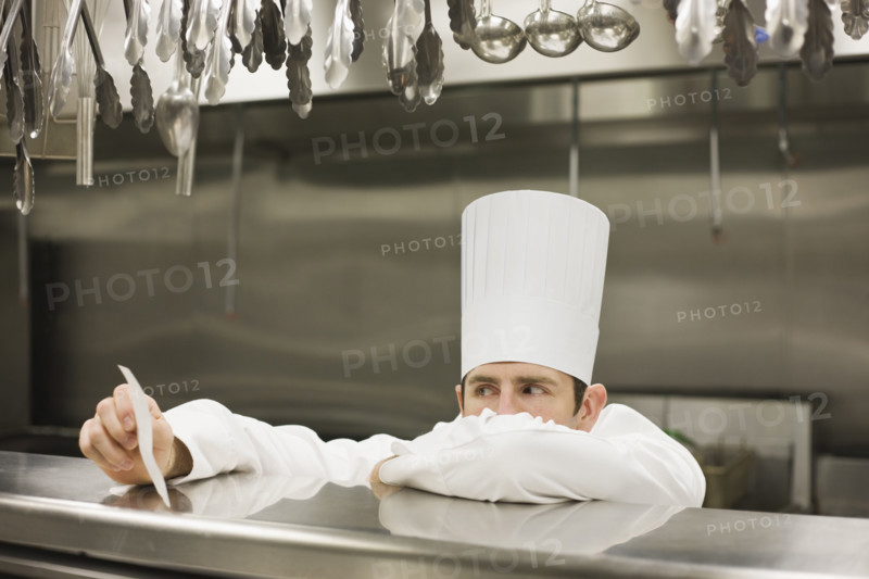 Frustrated chef reading ticket. Date : 2008
