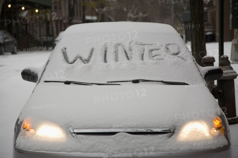 Parked car covered in snow. Date : 2008