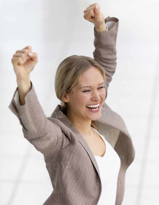 Happy businesswoman celebrating. Date : 2008