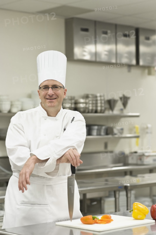 Chef posing in kitchen. Date : 2008