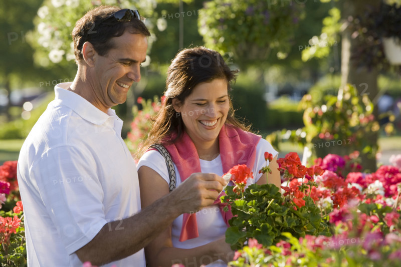 Couple shopping for flowers. Date : 2008