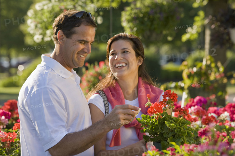 Couple shopping for flowers. Date : 2008