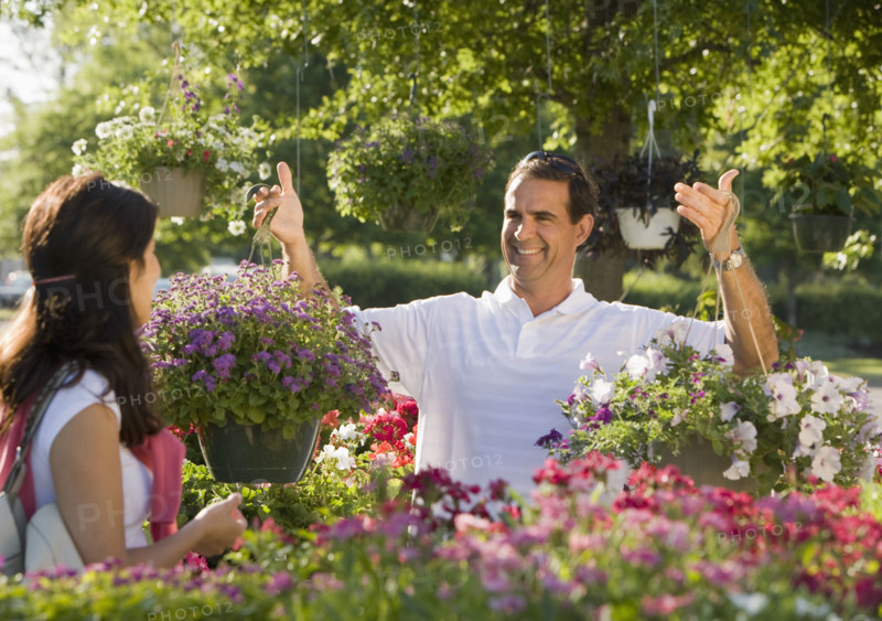 Couple shopping for flowers. Date : 2008