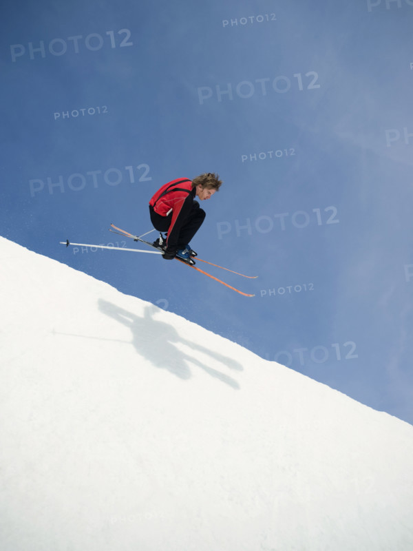 Skier jumping off lip of half-pipe. Date : 2008