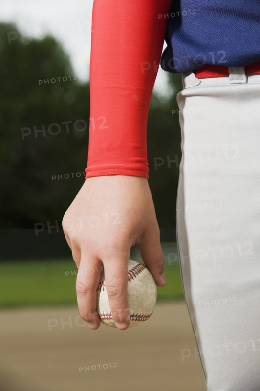 Baseball pitcher getting ready to throw ball. Date : 2008