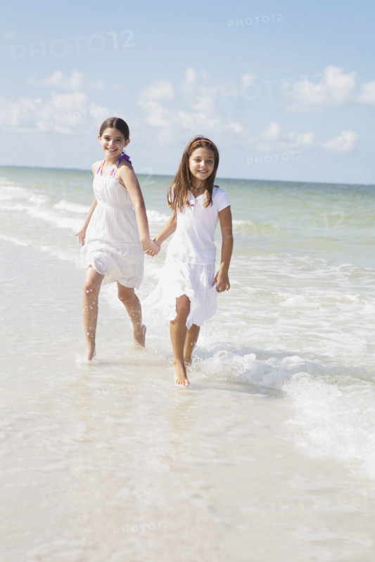 Girls running in ocean. Date : 2008