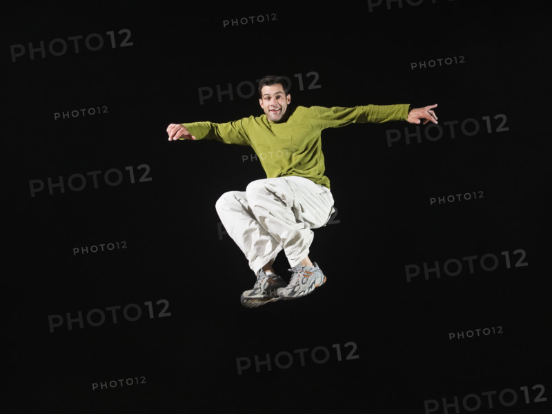 Portrait of man in mid-air. Date: 2008